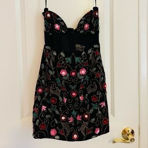 size small, original tags . Strapless and v cut